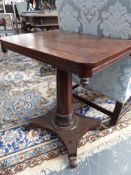 A Wm.IV INLAID MAHOGANY TILT TOP TABLE ON FACETED COLUMN SUPPORT AND PLATFORM BASE.