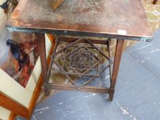 AN AESTHETIC TABLE WITH A PLANISHED COPPER CLAD TOP AND INTERLACED AND JOINED STAR FORM