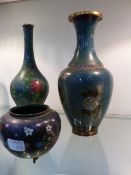 TWO CHINESE CLOISONNE VASES WITH FLORAL DECORATION ON A BLUE GROUND. 22CM HIGH AND A JAPANESE