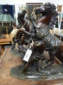 A PAIR OF 19TH.C.BRONZE MARLEY HORSES AFTER THE ORIGINALS BY COUSTOU. H.57cms
