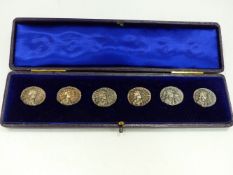 A SET OF SIX ART NOUVEAU HALLMARKED SILVER BUTTONS IN ORIGINAL CASE.