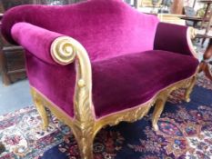 A CONTINENTAL CARVED GILTWOOD ITALIAN SHOW FRAMED SMALL SALON SETTEE POSSIBLY VENETIAN.