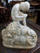 TWO VICTORIAN ALABASTER SCULPTURES AFTER THE ANTIQUE, SPINARIO AND A LION. HEIGHT OF LARGEST 29cms.