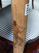 A CARVED DIDGERIDOO DECORATED WITH TRIBAL FIGURES AND ANIMALS. L.105cms.