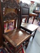 A 17TH/18TH.C.OAK BACK STOOL WITH TWIN CARVED PANELS OVER PLANK SEAT AND STRETCHER BASE AND