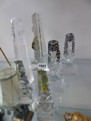 FIVE ANTIQUE CUT GLASS TABLE OBELISK ORNAMENTS WITH POLYCHROME DECORATION AND A ROCK CRYSTAL