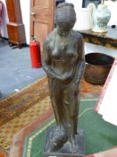 A LATE 19TH.C.PATINATED PLASTER FIGURE OF A CLASSICAL MAIDEN AFTER THE ANTIQUE, SIGNED INDISTINCTLY.
