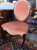 A PAIR OF 19TH.C.MAHOGANY BALLOON BACK SALON CHAIRS ON SLENDER CARVED CABRIOLE LEGS.