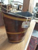 A TOLE DECORATED NAVETTE FORM BUCKET.