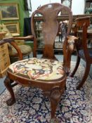 AN ANTIQUE AND LATER, CARVED WALNUT EARLY GEORGIAN STYLE BALLOON SEAT ARMCHAIR, EAGLE HEAD