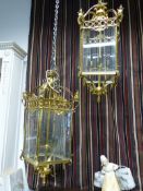 A PAIR OF BRASS VICTORIAN STYLE SQUARE FORM HALL LANTERNS. H.87cms.