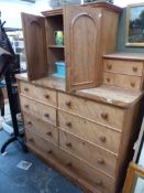 A VICTORIAN SATIN BIRCH CHEST OF SIX SHORT AND ONE LONG DRAWER WITH RAISED CUPBOARD