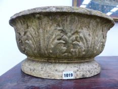 A PAIR OF COMPOSTITE STONE SHALLOW GARDEN PLANTERS WITH RELIEF DECORATION.