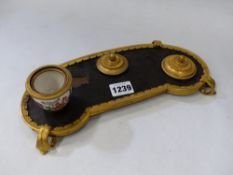 A FRENCH ORMOLU MOUNTED LACQUER INKSTAND, THE BASE OF SHAPED FORM