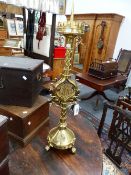 A BRASS GOTHIC REVIVAL LARGE PRICKET ALTAR CANDLESTICK, ELABORATE PIERCED BANDING AND MOUNTED WITH