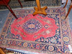 AN ANTIQUE PERSIAN TABRIZ RUG AND ANOTHER RUG
