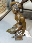 AN ANTIQUE BRONZE OF A CLASSICAL FIGURE SEATED ON A PLINTH, POSSIBLY ITALIAN. 16CM HIGH