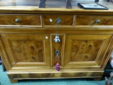 A LARGE FRENCH YEWWOOD SIDE CABINET WITH THREE DRAWERS OVER CUPBOARD BASE. H.142cms.