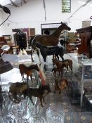 SIX COLD PAINTED BRONZE FIGURES OF HORSES, ONE WITH A CART. VARIOUS IMPRESSED MARKS, LARGEST H.