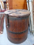 A VICTORIAN COOPERED BARREL WITH WROUGHT IRON MOUNTS AND LIFT TOP.