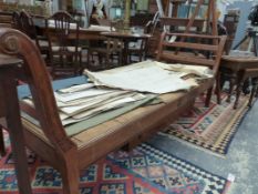 AN ANTIQUE FRENCH PROVINCIAL FRUITWOOD DAY BED WITH RUSH PANEL SEAT. W.224cms.