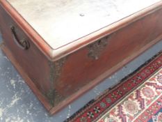 A LARGE EARLY WROUGHT IRON MOUNTED COLONIAL HARDWOOD BLANKET BOX WITH FLANKING CARRYING HANDLES. W.