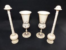 A PAIR OF INDIAN TURNED IVORY ROSE WATER SPRINKLERS AND A PAIR OF SIMILAR GOBLETS WITH ETCHED