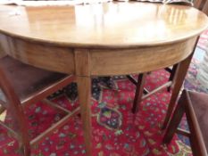 A GEO.III.MAHOGANY D-END DINING TABLE WITH DROP LEAF CENTRE SECTION ON SQUARE TAPERED LEGS WITH