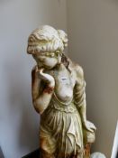 A LARGE CAST IRON GARDEN STATUE OF A DRAPED CLASSICAL MAIDEN. H.140cms.