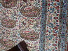 AN UNUSUAL PERSIAN CARPET WITH PAISLEY MOTIFS. 390 X 278CM