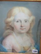 AN 18TH.C.CONTINENTAL SCHOOL PORTAIT OF A YOUNG GIRL HOLDING A DOVE, PASTEL IN PERIOD CARVED GILT