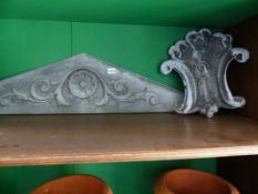 TWO ANTIQUE ZINC ARCHITECTURAL PEDIMENTS.