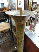 A PIERCED BRASS MOORISH DESIGN FLOOR STANDING LAMP BASE. CALLIGRAPHIC DECORATION. ELECTRIFIED.