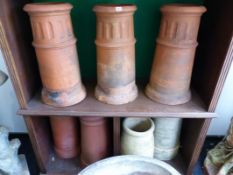 A SET OF THREE ANTIQUE TERRA COTTA CHIMNEY POTS AND FIVE OTHERS VARIOUS.