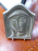 A 20TH.C.PATINATED BRONZE PLAQUE WITH A PORTRAIT OF MARY, IN THE MANNER OF ERIC GILL. H.17cms.