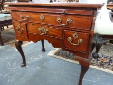 A GEO.III.MAHOGANY LOWBOY DRESSING TABLE WITH BRUSHING SLIDE OVER ONE LONG AND THREE SHORT DRAWERS