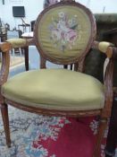 A PAIR OF FRENCH LOUIS XVI STYLE ARMCHAIRS WITH FLORAL NEEDLEPOINT EMBROIDERED BACK PANEL TOGETHER