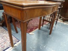 A GEO.III. STYLE MAHOGANY CROSS BANDED SERPENTINE FOLD OVER CARD TABLE ON SHAPED MOULDED LEGS WITH