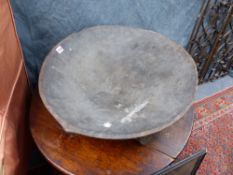 A LARGE CARVED POLYNESIAN CEREMONIAL HARDWOOD BOWL. D.68cms.