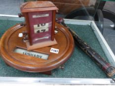 AN EARLY 20TH.C.OAK WALL CALENDAR TOGETHER WITH A DESK TOP EXAMPLE AND AN UNUSUAL VICTORIAN