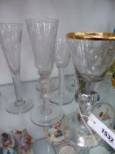 SEVEN ANTIQUE AND LATER WINE GLASSES, SOME WITH TWIST STEMS AND ETCHED DECORATION