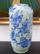 A CHINESE CELADON GLAZE CYLINDER FORM VASE WITH BLUE RELIEF DECORATION OF EQUESTRIAN MOUNTED