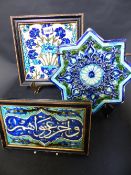 THREE PERSIAN TILES OF CLASSIC DESIGN AND COLOUR.