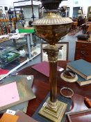 AN IMPRESSIVE VICTORIAN BRASS OIL LAMP, CORINTHIAN COLUMN ON STEPPED BASE AND FROSTED ETCHED