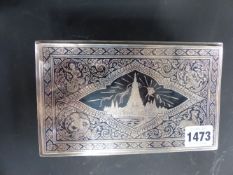 A SIAMESE SILVER COLOURED RECTANGULAR CIGARETTE BOX WITH NIELLO DECORATION.19CM X 12CM. INSCRIBED.