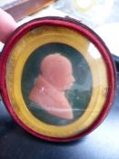 A EARLY 19TH.C.WAX OVAL PROFILE PORTRAIT OF A GENTLEMAN IN A MOROCCO LEATHER FITTED CASE.