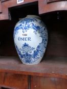 AN ANTIQUE DELFT BLUE AND WHITE BALUSTER FORM TOBACCO JAR INSCRIBED ST.OMER. H.28cms.