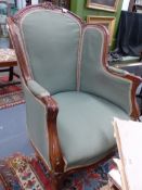A FRENCH LOUIS XV STYLE SHOW FRAME ARMCHAIR.