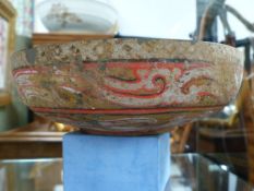 AN INTERESTING POTTERY BOWL WITH STYLIZED CELTIC DESIGNS. D.20cms.