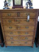 A LARGE ANTIQUE VICTORIAN PITCH PINE TALL CHEST OF TWO SHORT AND FIVE LONG DRAWERS. 147x125cms.
